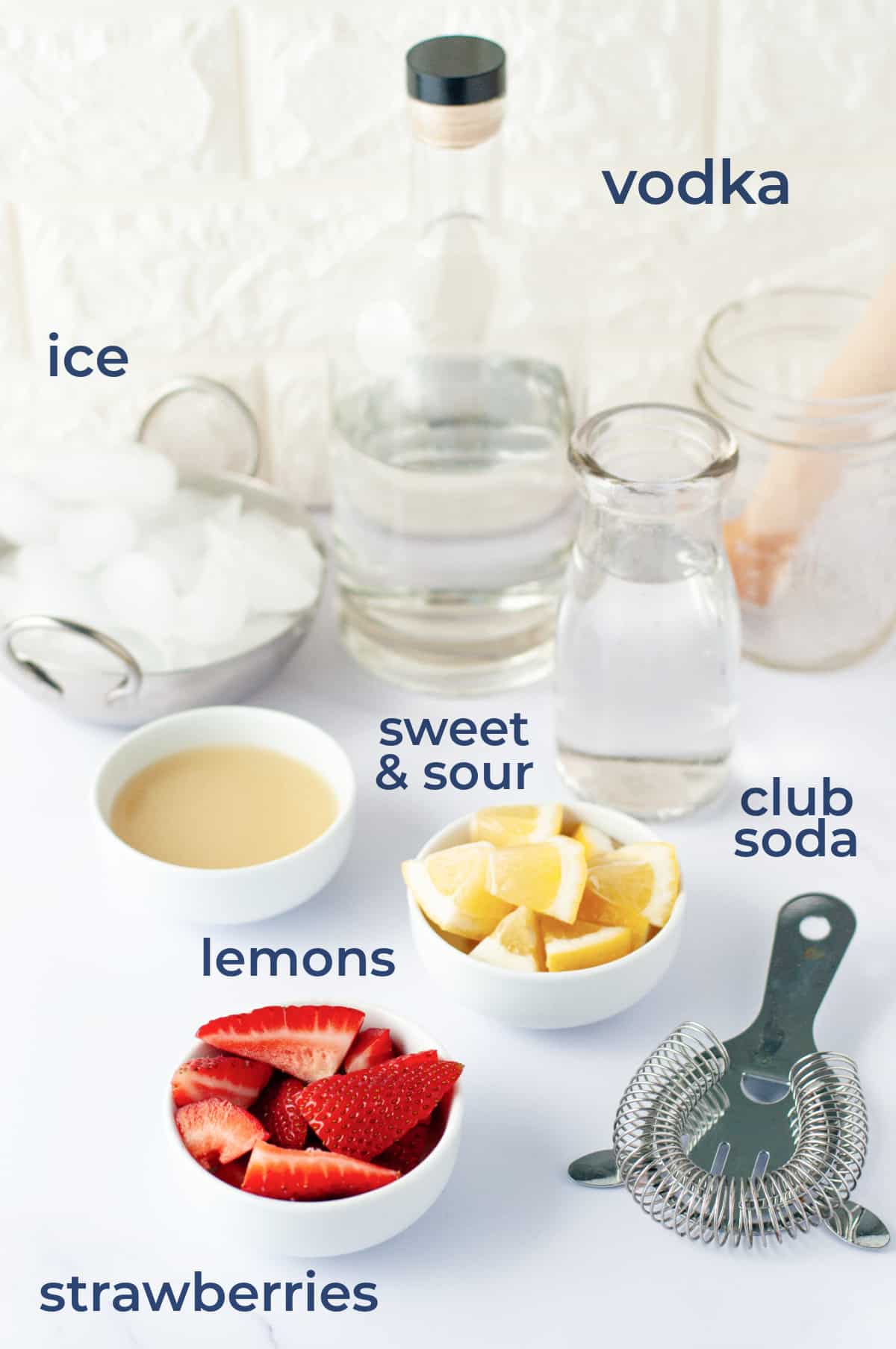 Ingredients for Sparkling Hard Strawberry Lemonade- vodka, strawberries, lemons, sweet and sour, club soda