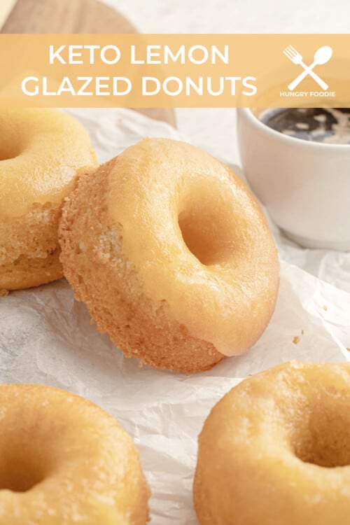 Gluten free lemon donuts on parchment paper, served with espresso.