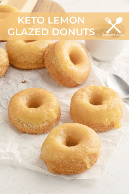 low carb glazed donuts piled up on white parchment paper