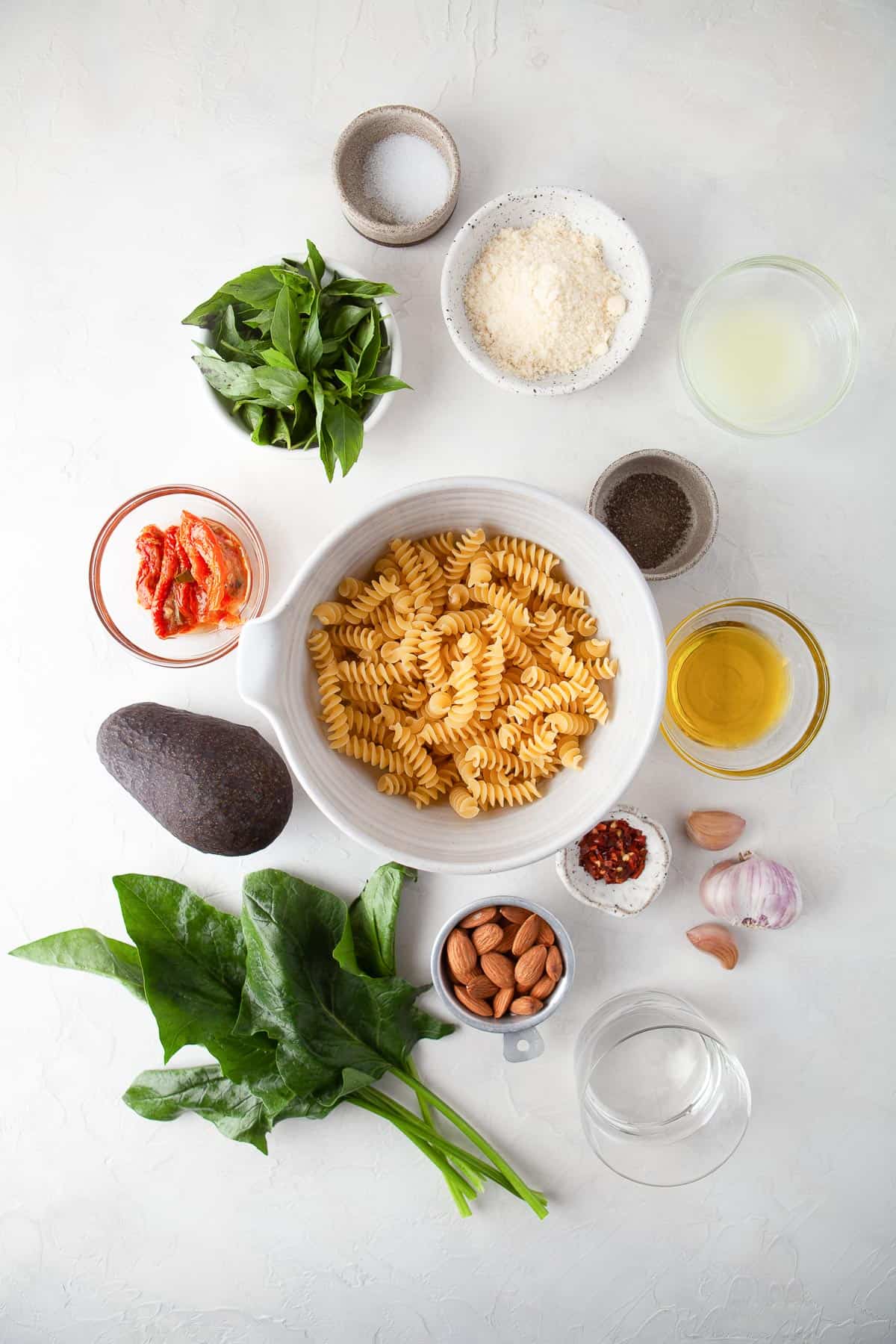 ingredients laid out to make home pesto and pasta